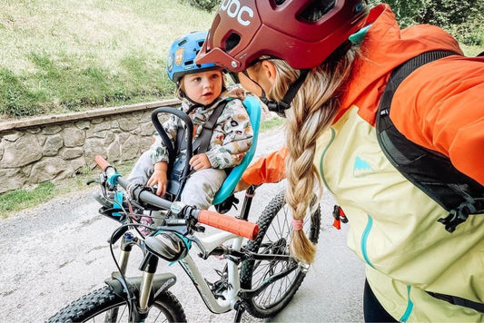 Mountain bike kid riding in a Thule Yepp Nexxt Mini seat