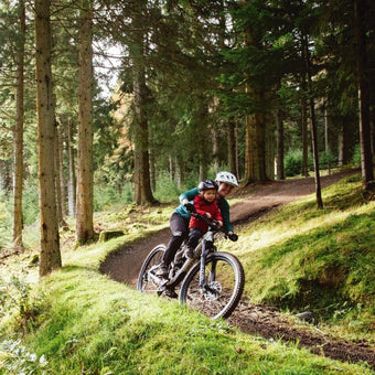 Shotgun Front Mounted Child Bike Seat Riding With Parent with Child Handlebars On Trail